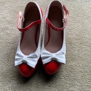 Vintage inspired red and white Mary Jane pumps.